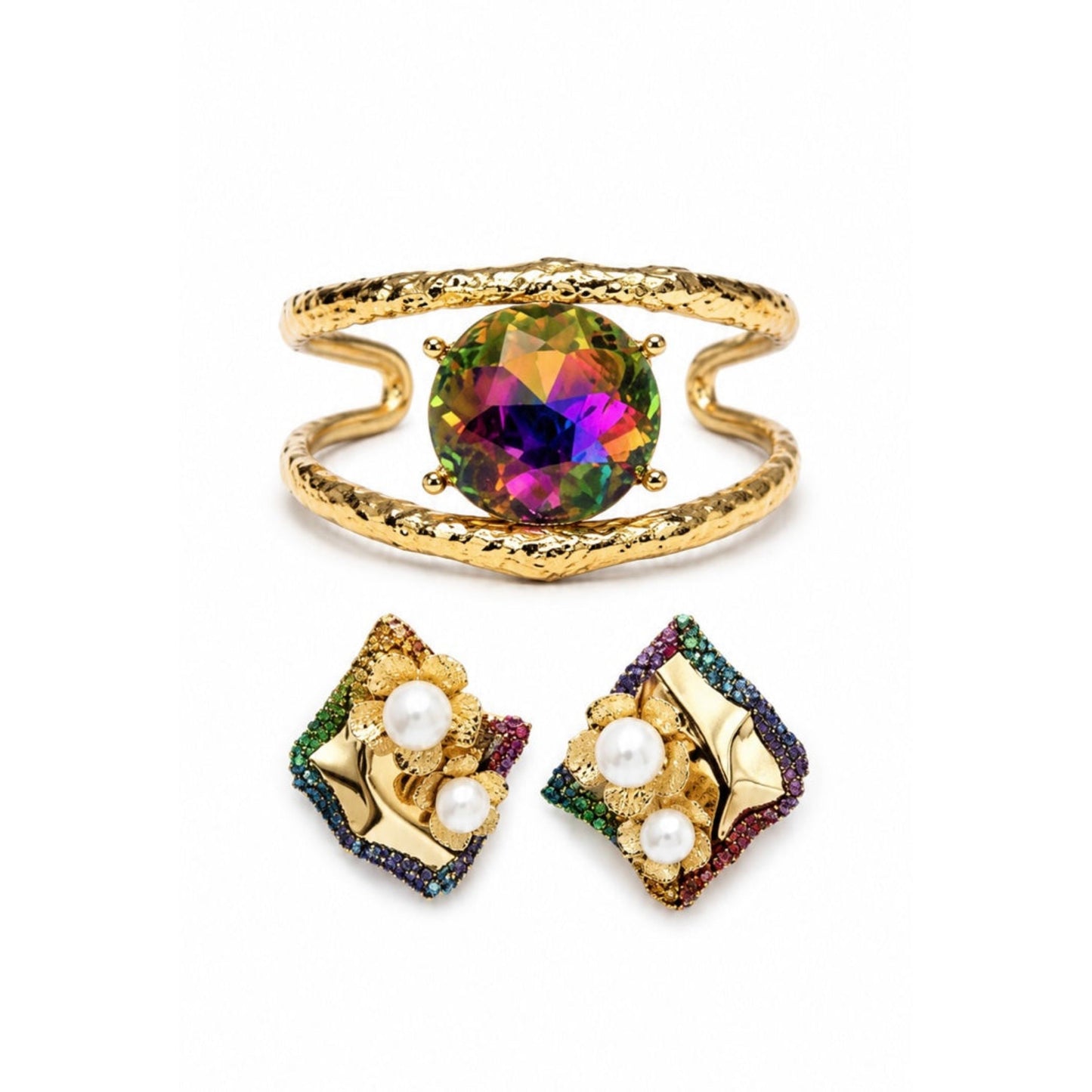 Gold jewelry set featuring an open cuff bracelet with a multicolor prism crystal and matching floral stud earrings with faux pearls and multicolor crystal accents.