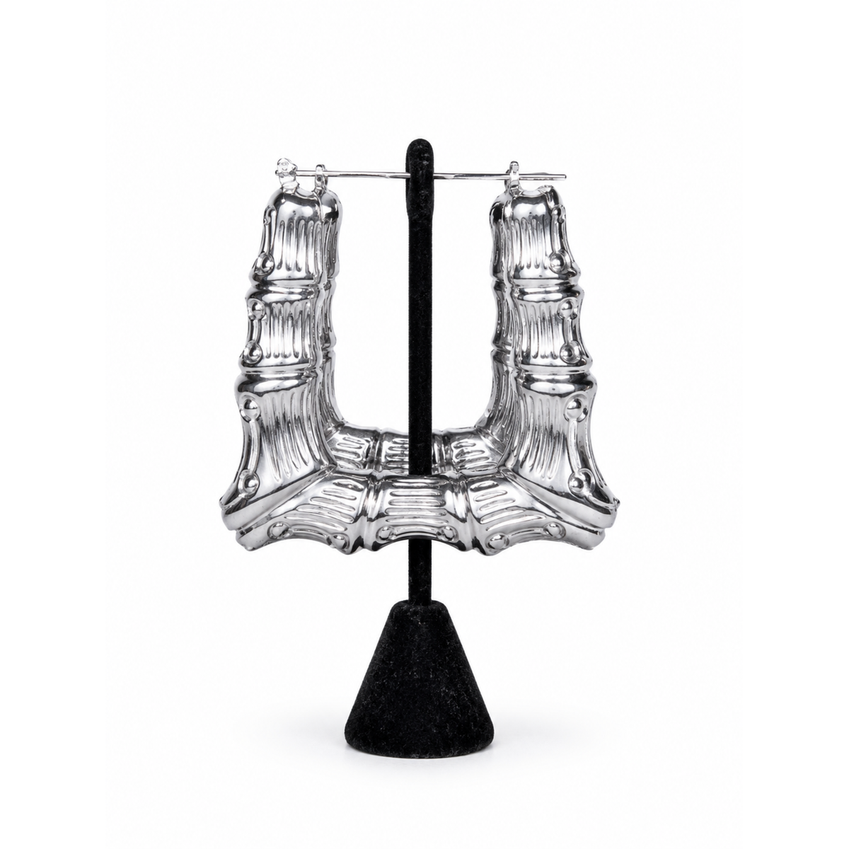 Silver rectangular bamboo hoop earrings with textured ribbed detailing and polished metallic finish