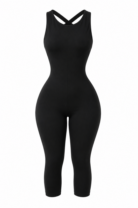Women's black sleeveless crisscross black capri jumpsuit with a high neckline, soft stretch fabric, pull-on design and capri-length legs. 
