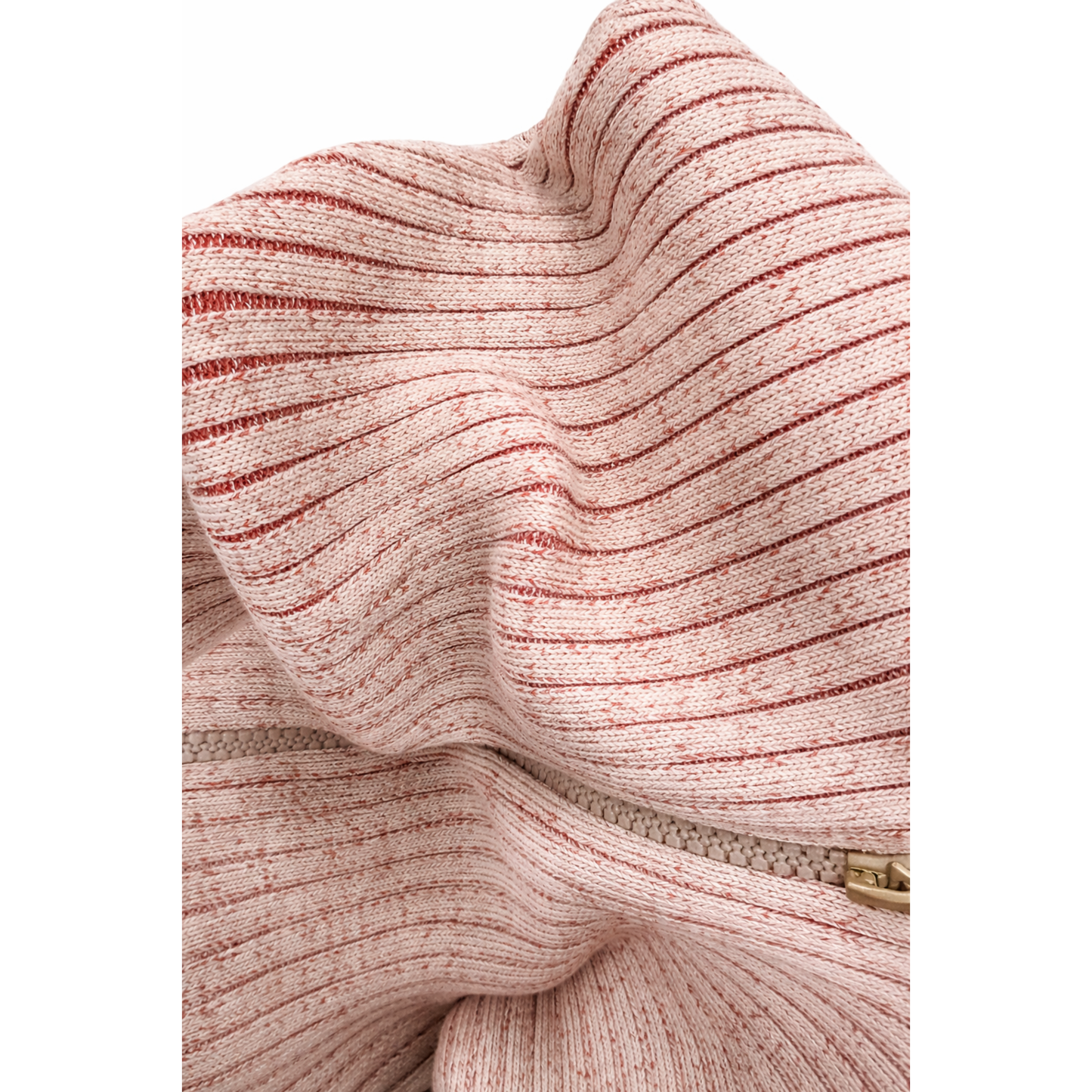 Close-up of ribbed knit fabric in ember fade ombre color, soft stretch textured material with vertical ribbing detail. 