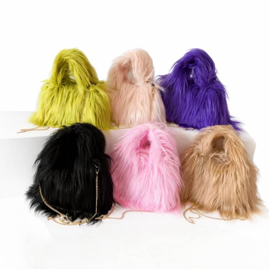 Faux fur chain crossbody handbag with top handle and magnetic closure, available in black, lime green, mauve, purple, pink, and tan.