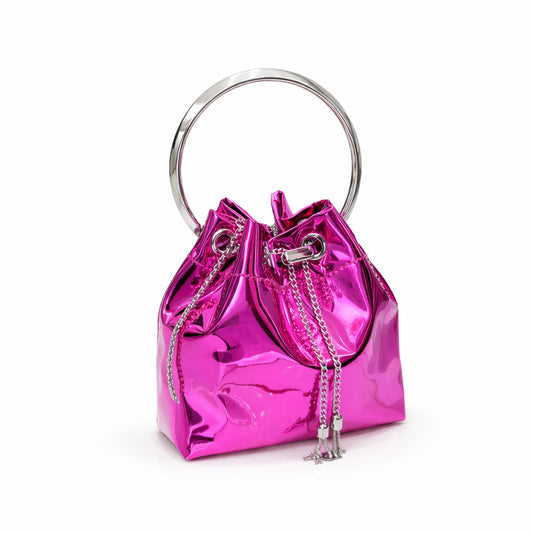 Fuchsia high-shine metallic bucket bag with circular top handle and chain shoulder strap. 