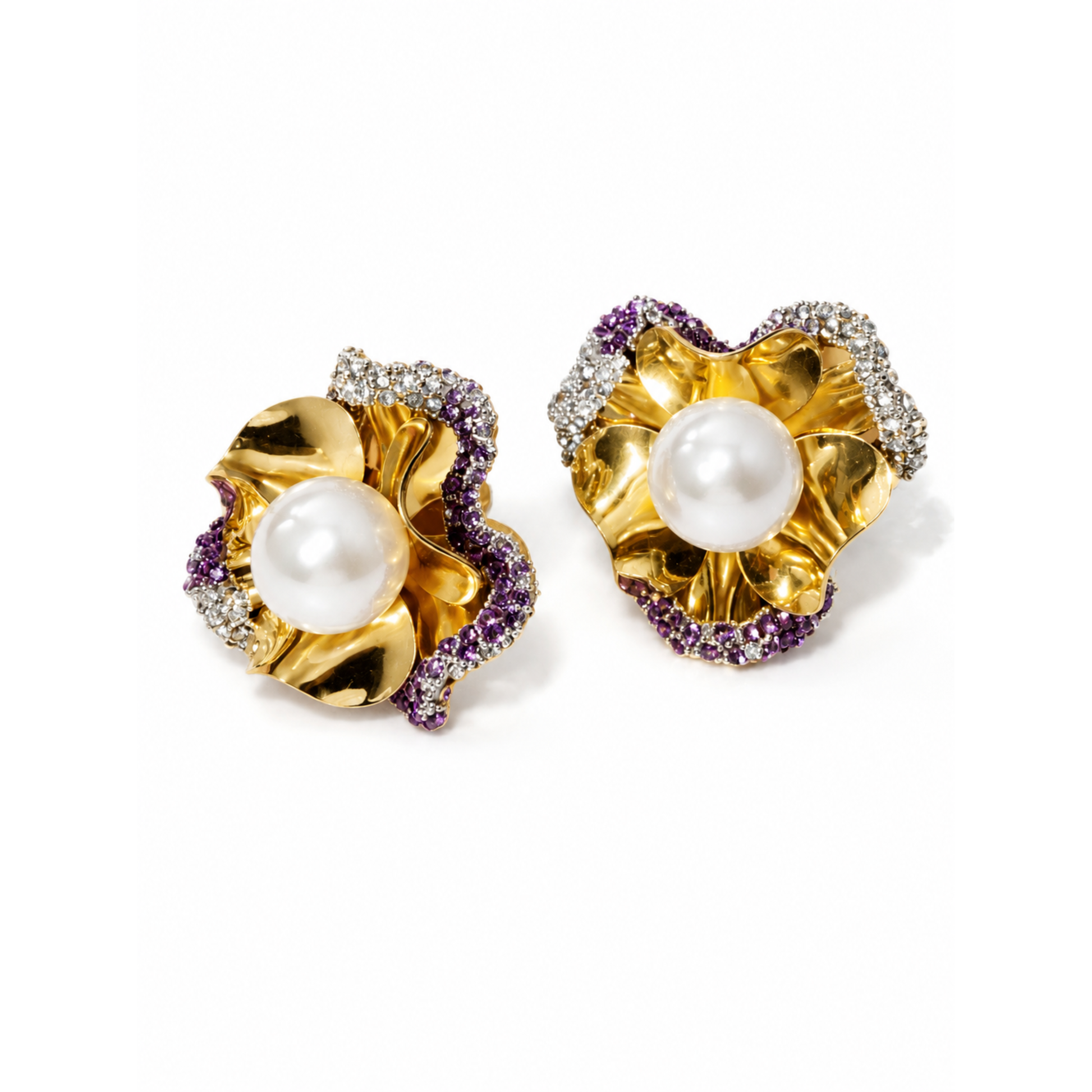 Gold sculpted flower stud earrings featuring a faux pearl center with purple and clear crystal trim in a textured floral design.