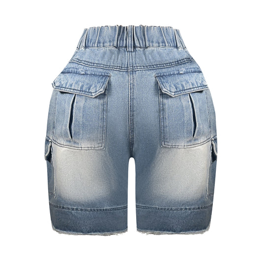 Back view of medium wash distressed denim Bermuda cargo shorts with high rise fit and utility cargo pockets.