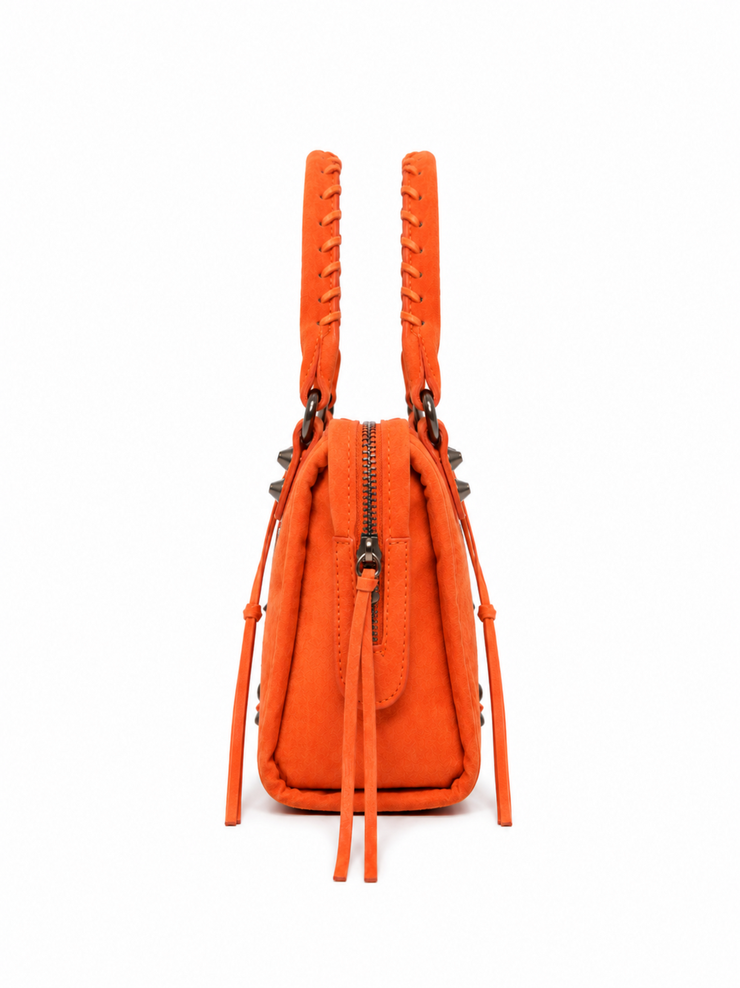 Orange studded moto tassel satchel handbag with suede-look finish, antique bronze hardware and structured side profile.