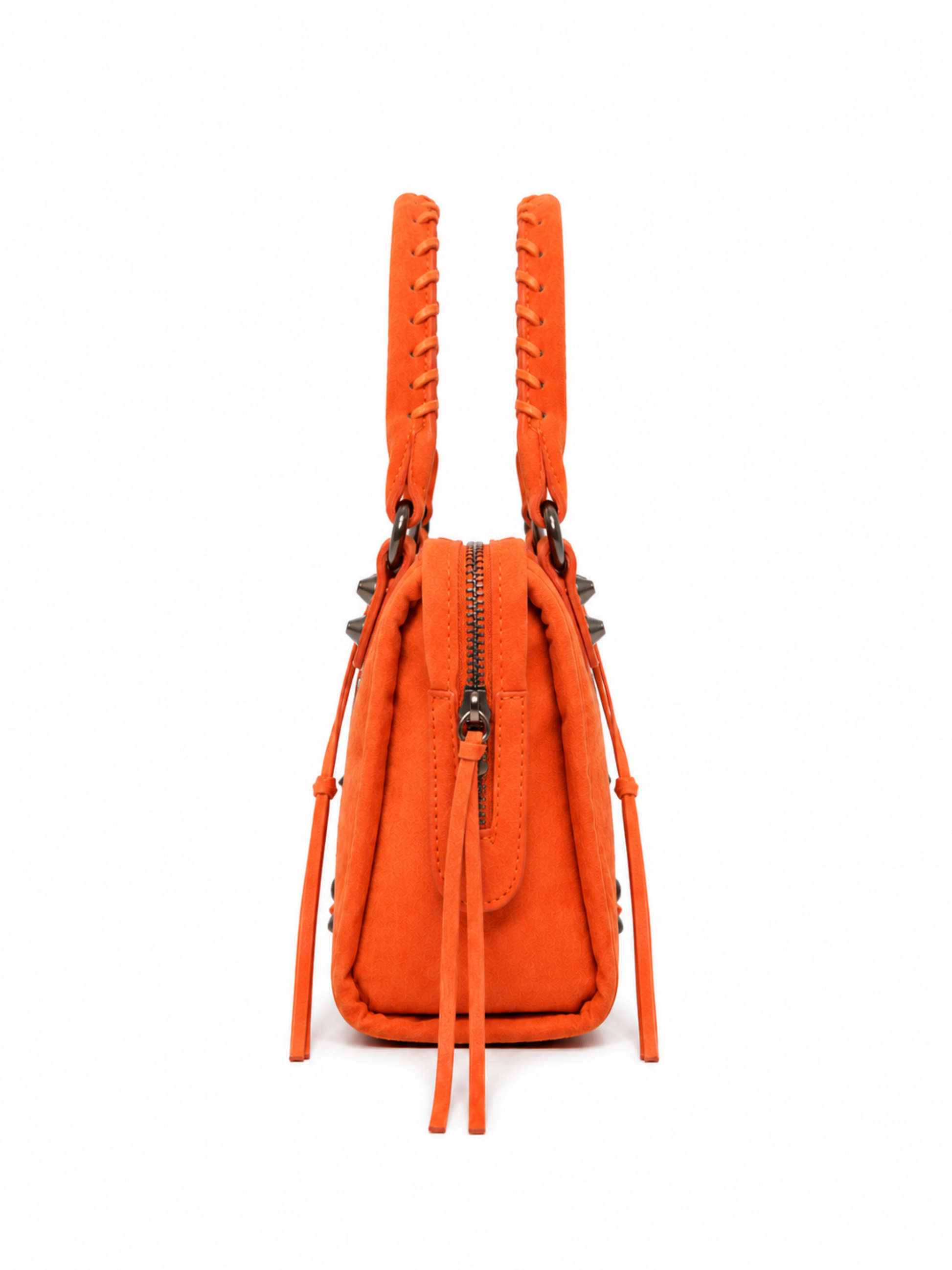 Orange studded moto tassel satchel handbag with suede-look finish, antique bronze hardware and structured side profile.