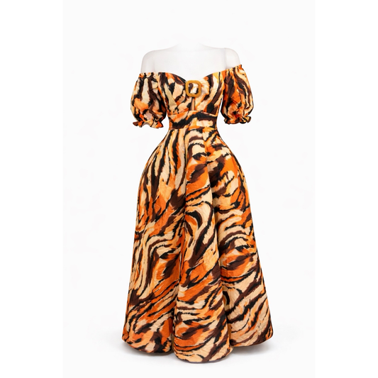 Orange multi-color tiger print maxi dress with puff short sleeves, front hardware detail, open back with tie, and elastic waist in Colombian-style silk.